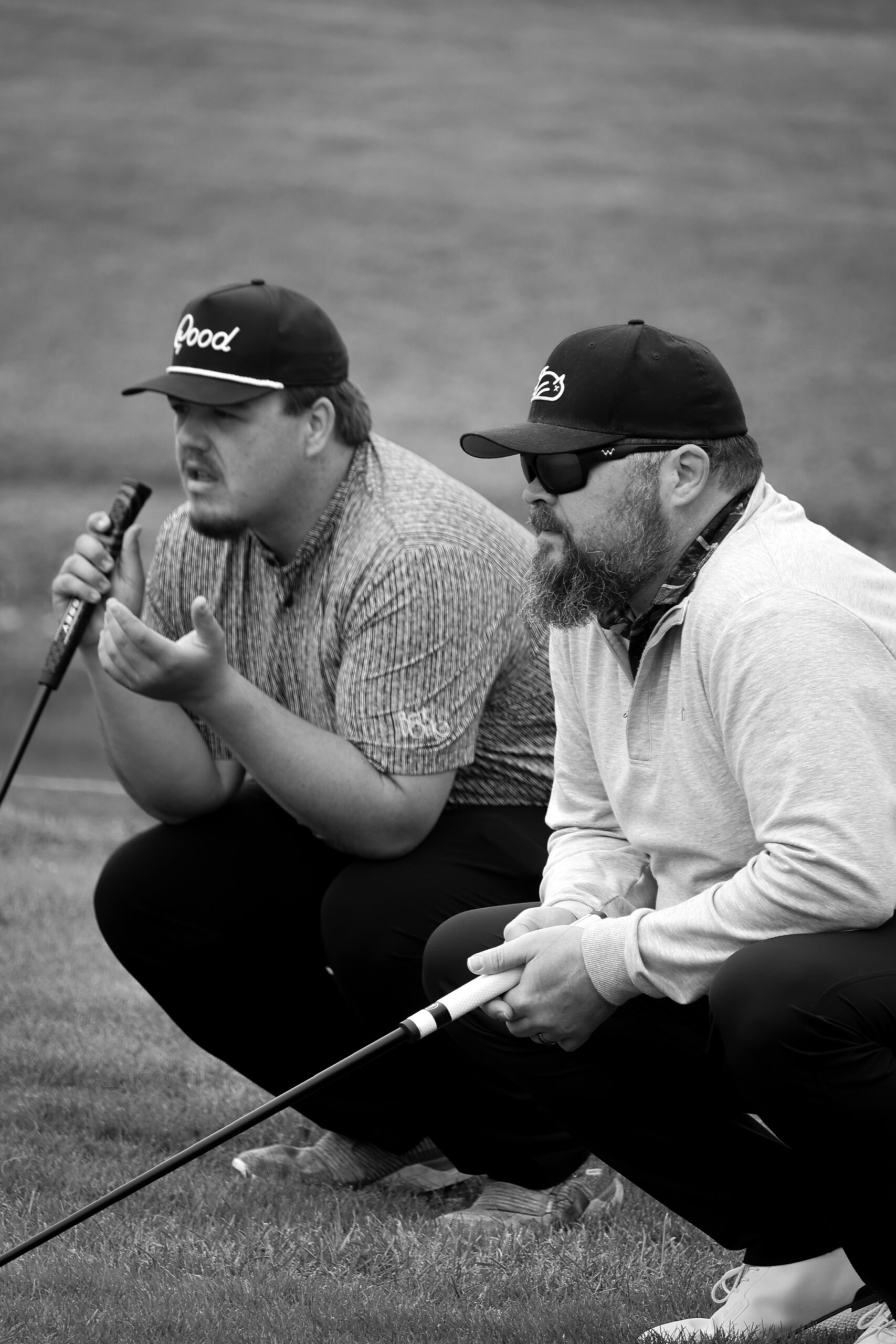 Hunter Miller and his dad ponder the putting lines as they read the green.